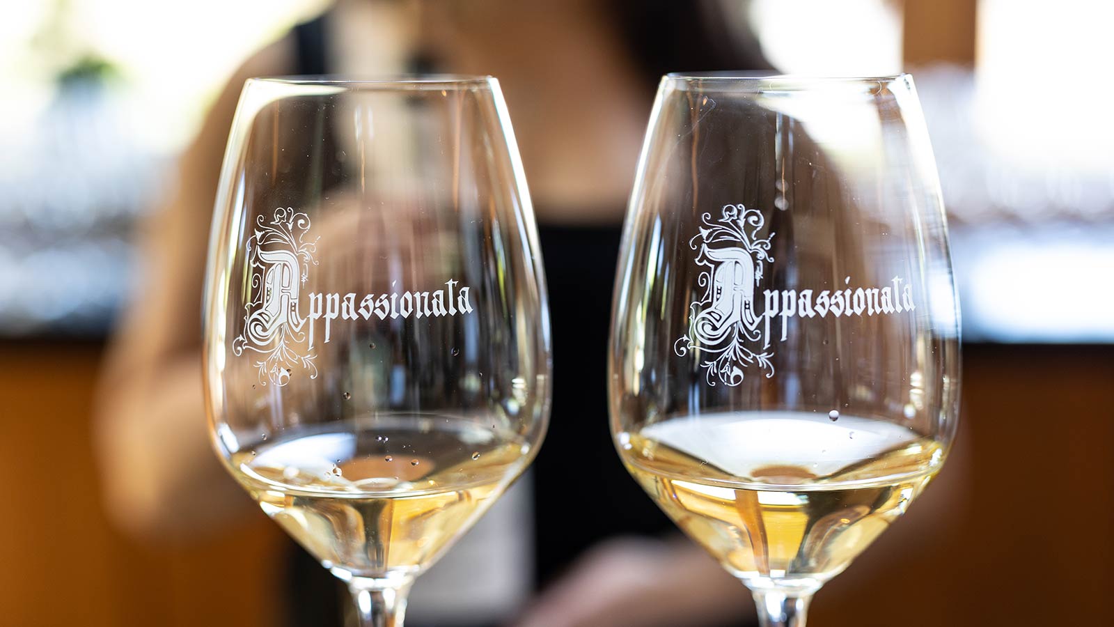 Two glasses of white wine. Two glasses of white wine.