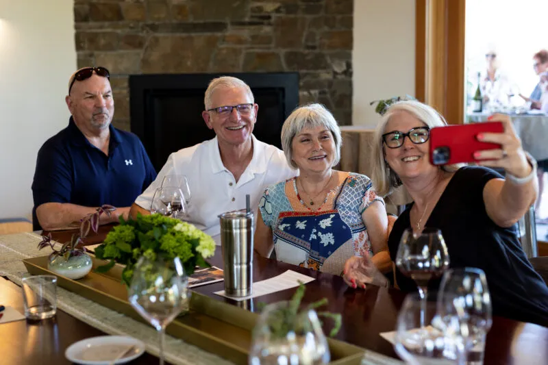 A group of friends taking a selfie at Appassionata Estate tasting room