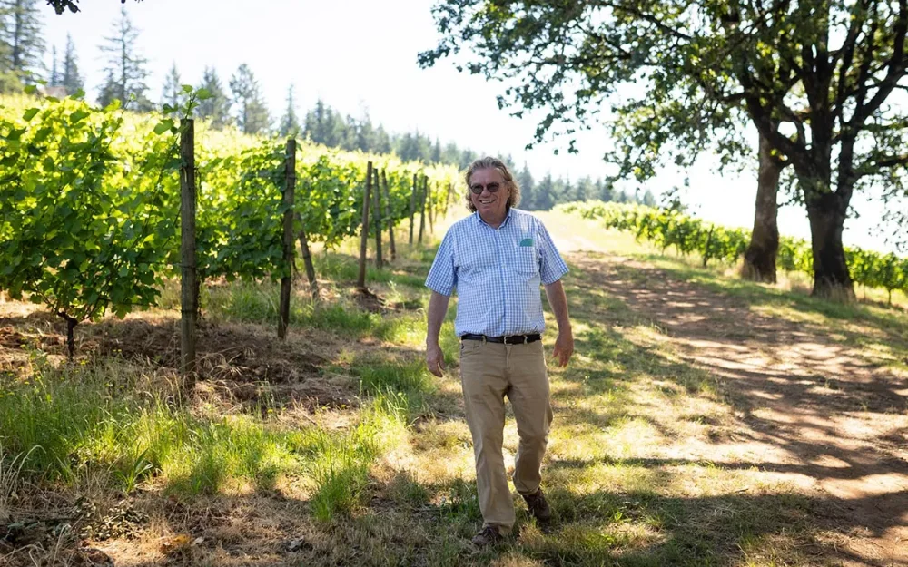 Appassionata Estate Owner and Winemaker Ernst Loosen walking through the vineyard